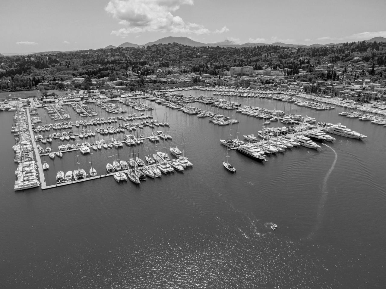 A luxury private jet on a runway at sunset